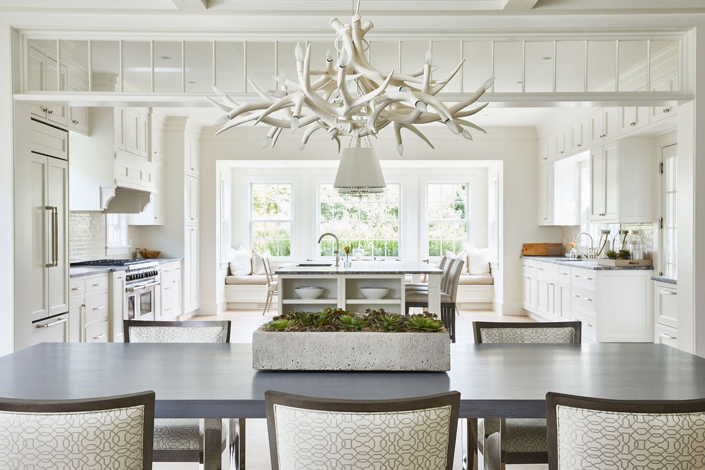 25 Pilgrim Road Nantucket, MA 02554 - Photo 12 of 28 a living room with dining table and chairs