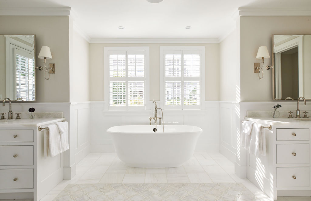 25 Pilgrim Road Nantucket, MA 02554 - Photo 17 of 28 a spacious bathroom with a double vanity sink a mirror and a bathtub