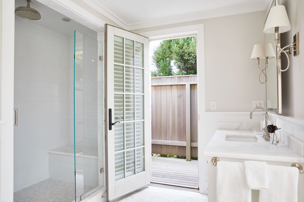 25 Pilgrim Road Nantucket, MA 02554 - Photo 18 of 28 a bathroom with a sink and a mirror