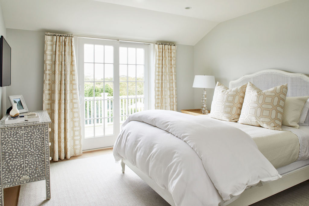 25 Pilgrim Road Nantucket, MA 02554 - Photo 20 of 28 a bed sitting in a bedroom next to a window