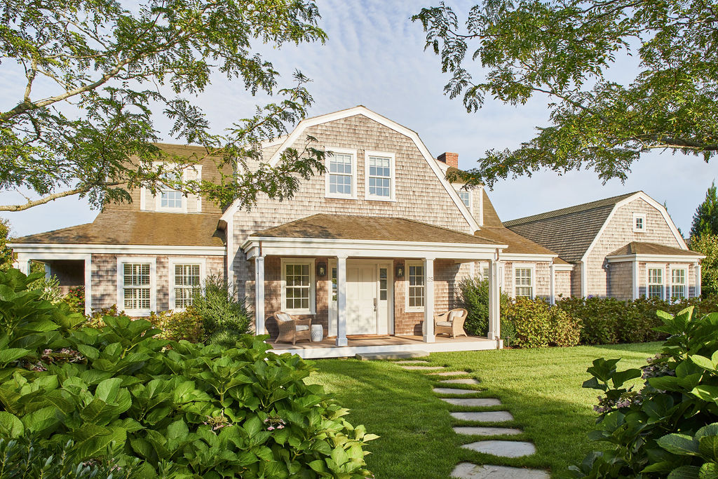 25 Pilgrim Road Nantucket, MA 02554 - Photo 2 of 28 a front view of a house with a garden