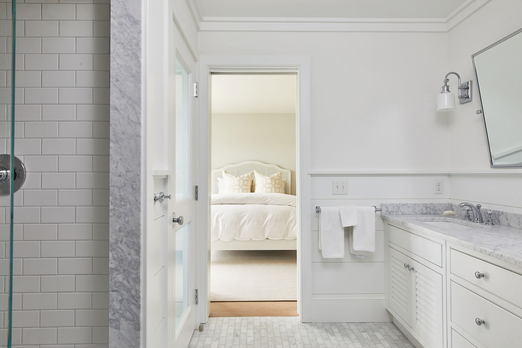 25 Pilgrim Road Nantucket, MA 02554 - Photo 23 of 28 a en suite bathroom with a granite countertop sink and a mirror