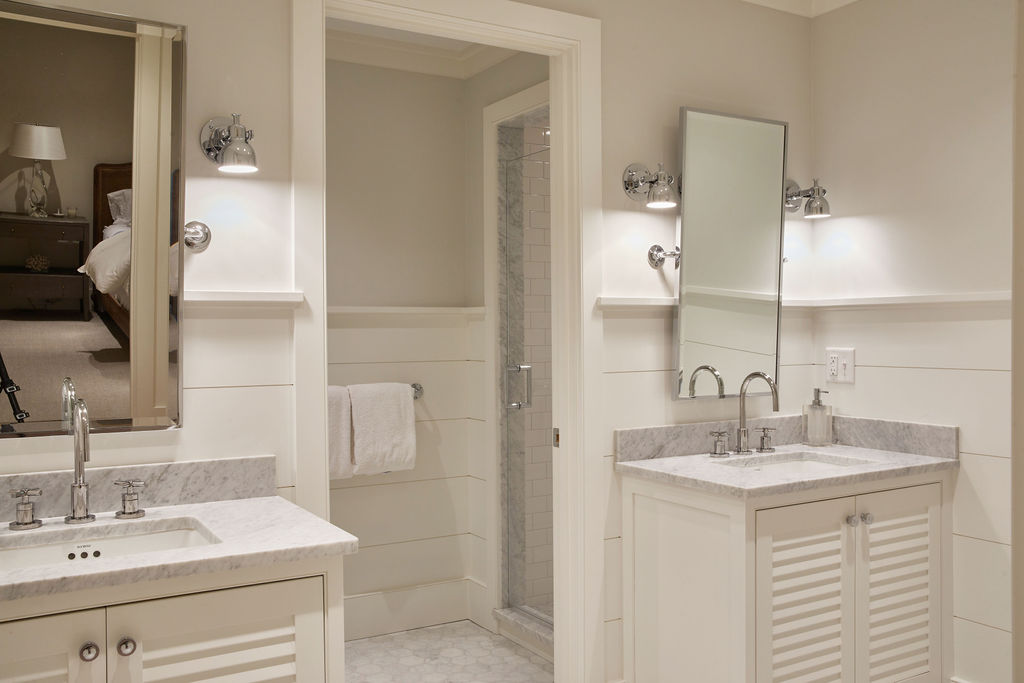 25 Pilgrim Road Nantucket, MA 02554 - Photo 26 of 28 a bathroom with a sink double vanity and a mirror
