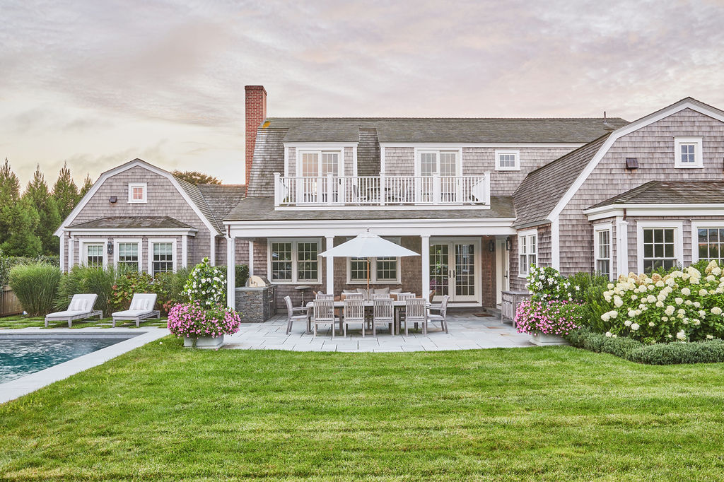 25 Pilgrim Road Nantucket, MA 02554 - Photo 5 of 28 a front view of a house with garden and outdoor seating