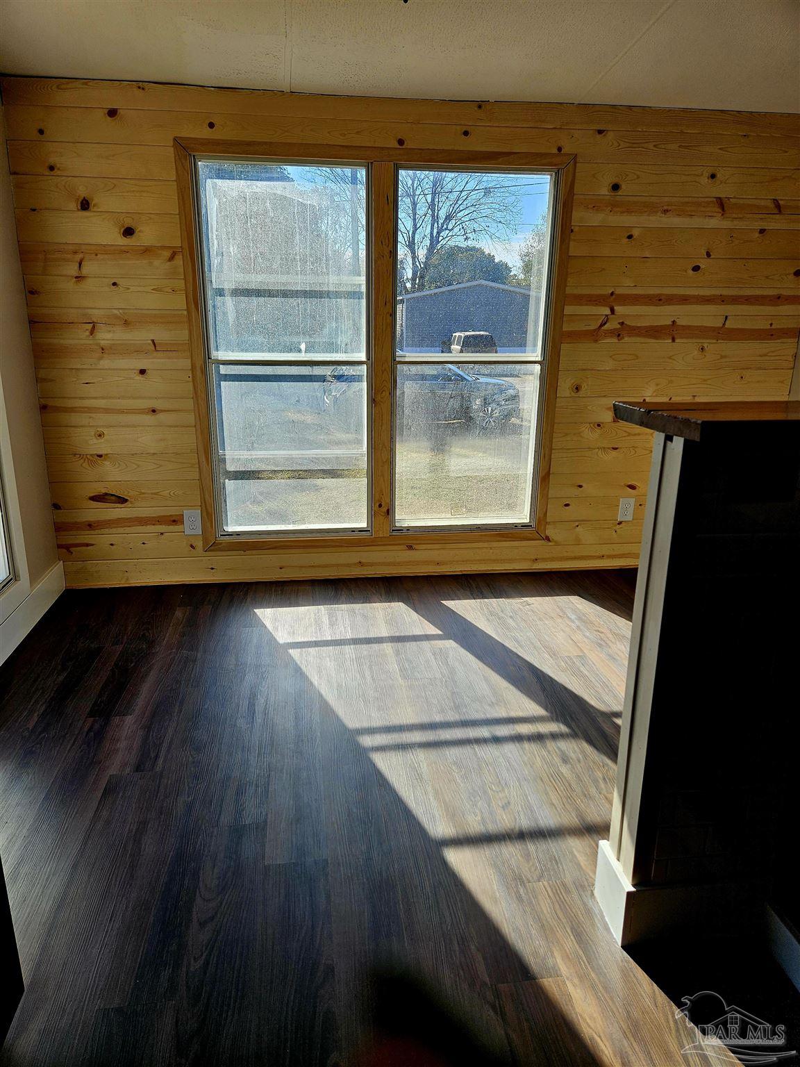 4240 Ewell Street Pace, FL 32571 - Photo 16 of 16 a view of a door of the house