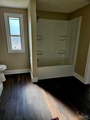 a view of lot of wooden floor