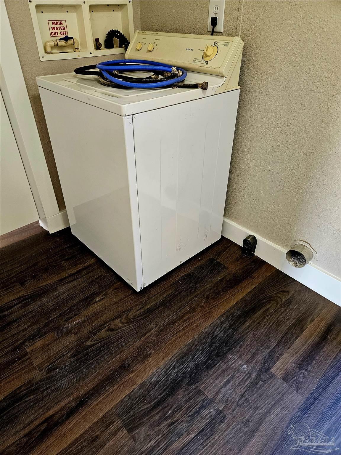4240 Ewell Street Pace, FL 32571 - Photo 9 of 16 a utility room with dryer and washer