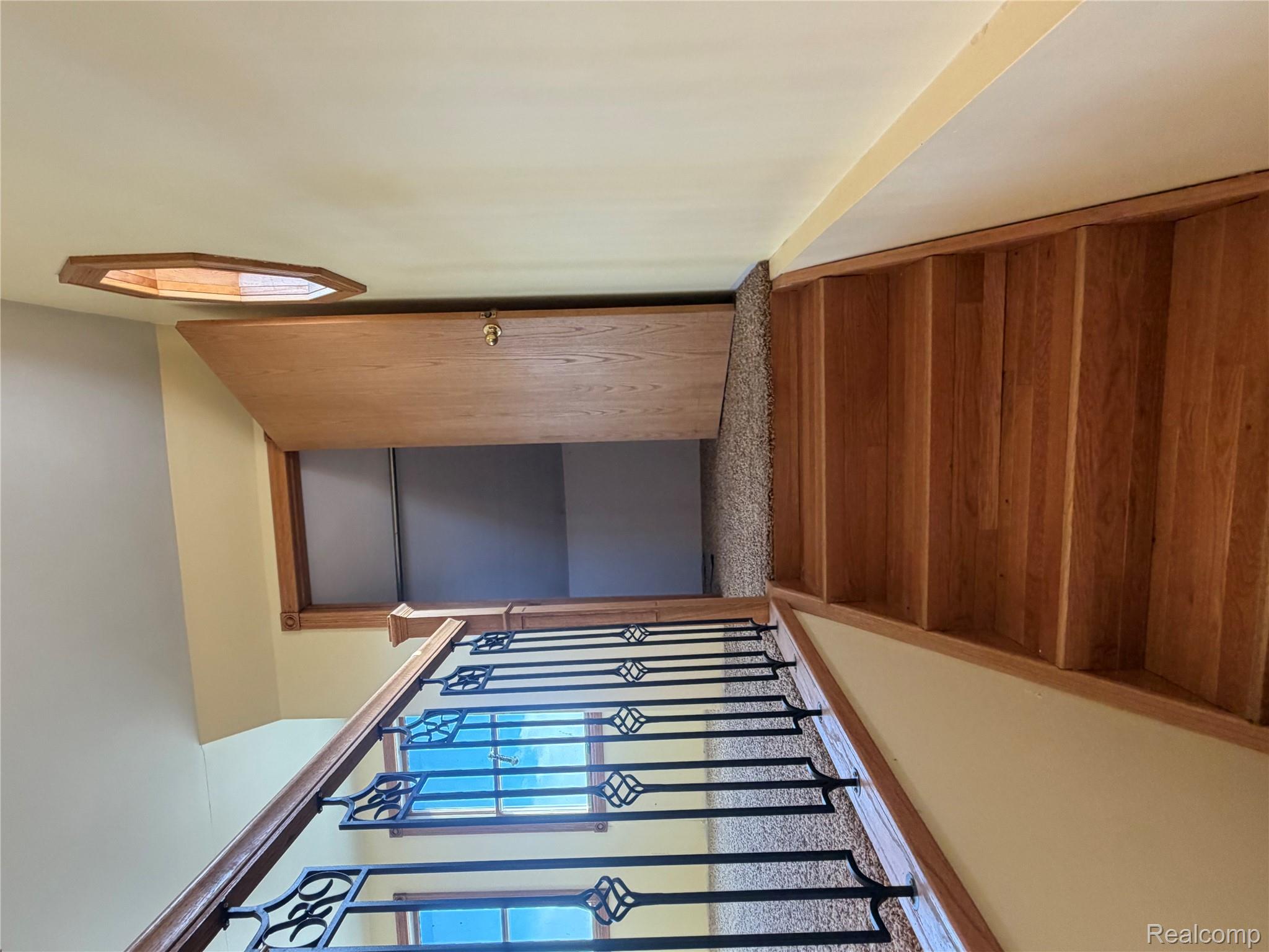 2455 Jacob Road Caro, MI 48723 - Photo 19 of 28 Staircase with wood finished floors