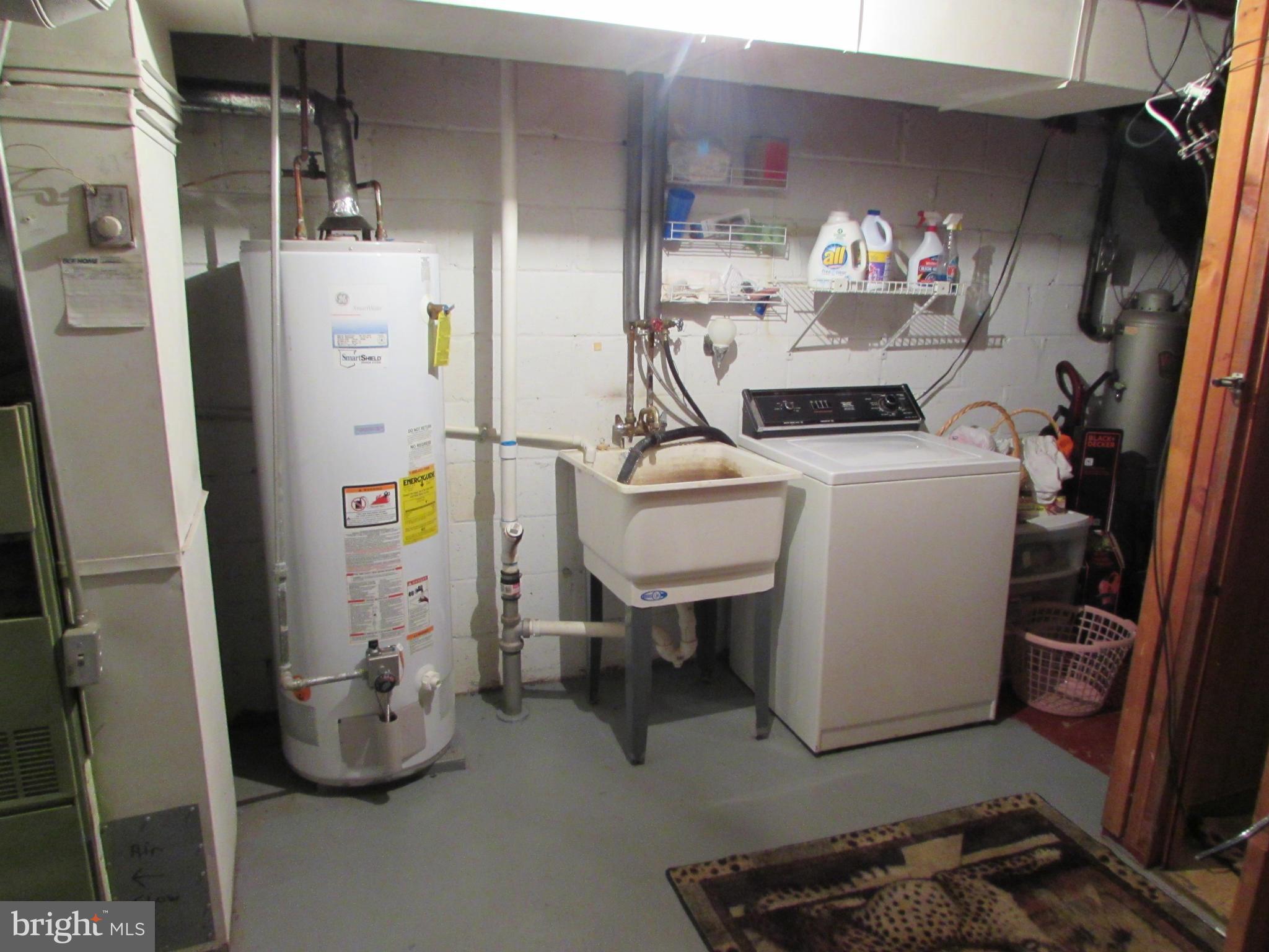 8617 Oak Road Baltimore, MD 21234 - Photo 13 of 16 a room with storage and utility