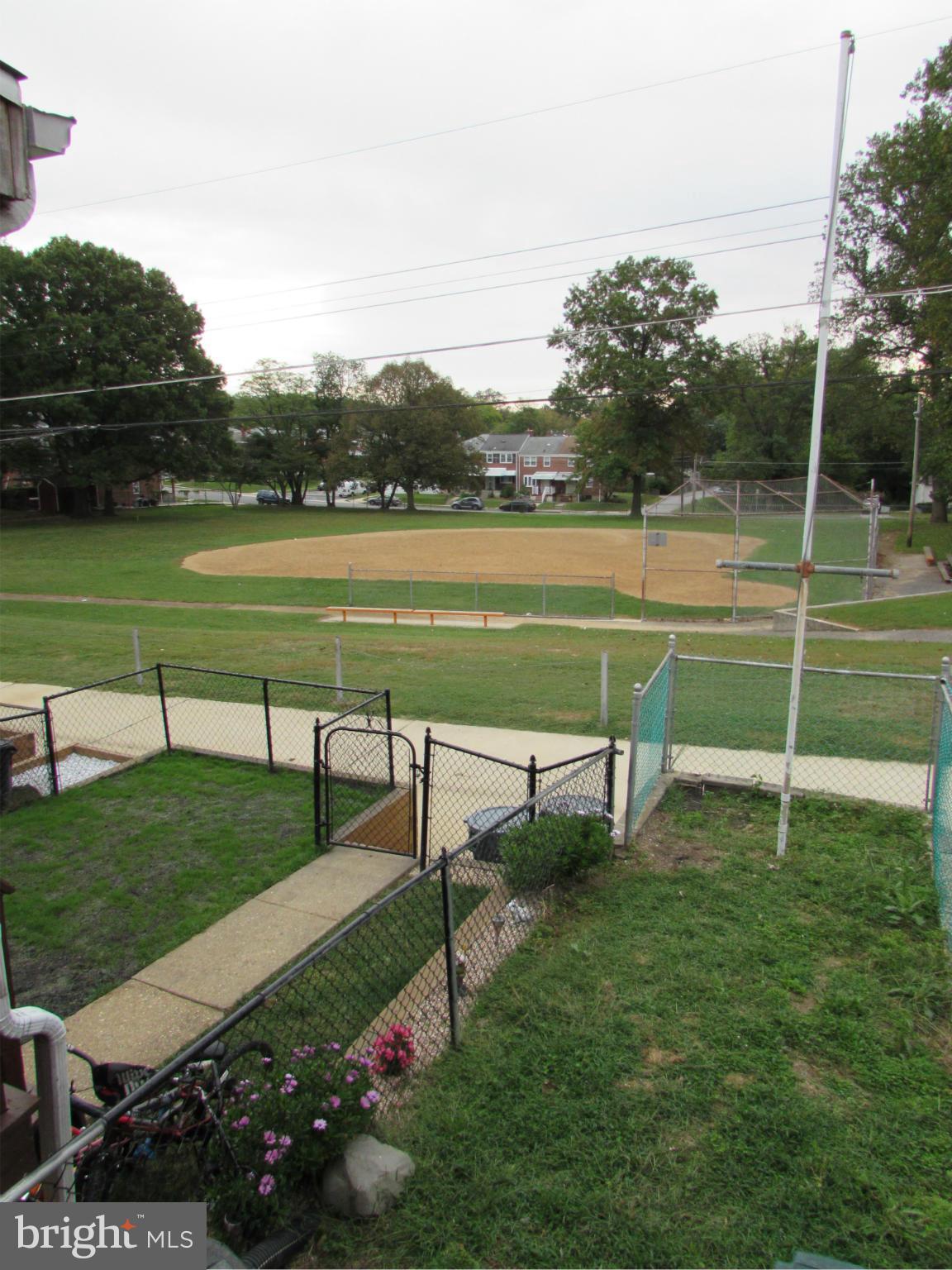 8617 Oak Road Baltimore, MD 21234 - Photo 15 of 16 a view of a swimming pool with a yard