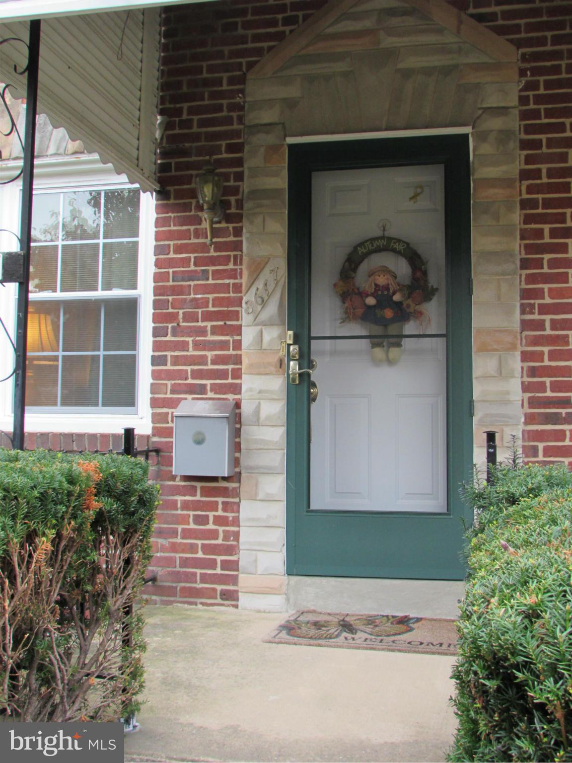 8617 Oak Road Baltimore, MD 21234 - Photo 16 of 16 a front view of a house with garden