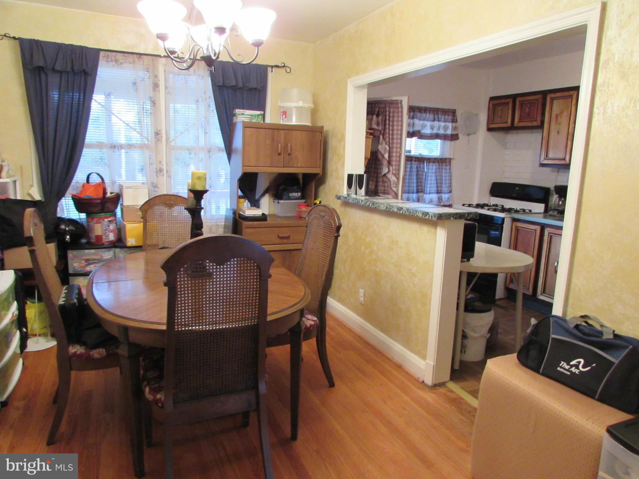 8617 Oak Road Baltimore, MD 21234 - Photo 8 of 16 a dining room with furniture and window
