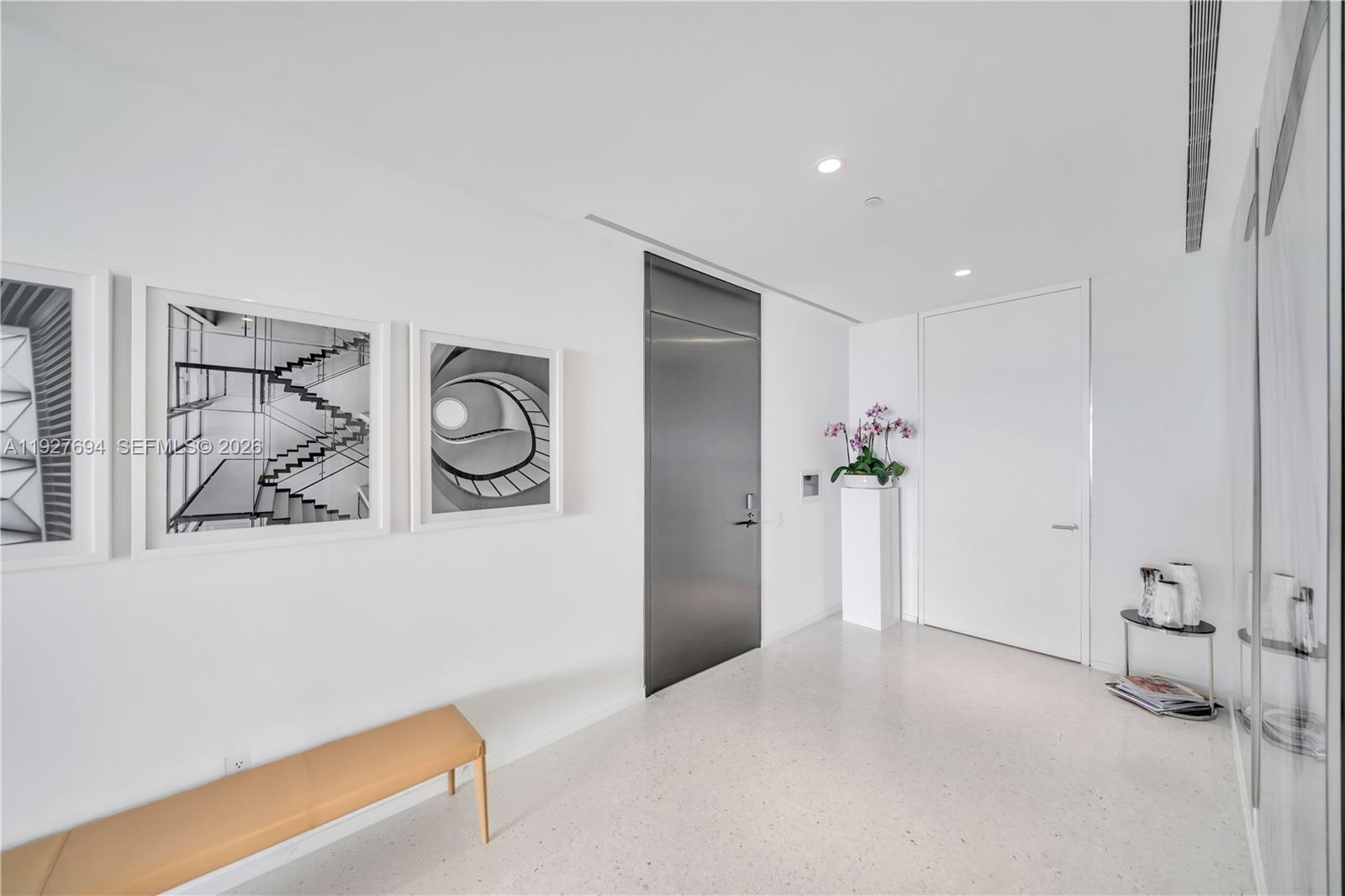 3315 Collins Avenue, Unit 10A Miami Beach, FL 33140 - Photo 26 of 48 a view of a livingroom with a couch