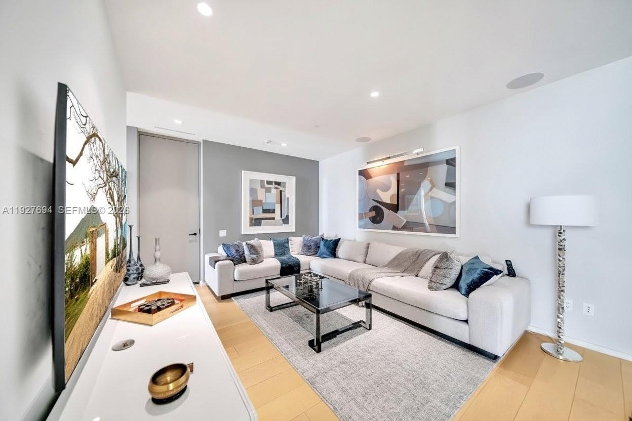 3315 Collins Avenue, Unit 10A Miami Beach, FL 33140 - Photo 35 of 48 a view of a livingroom with furniture and a couch