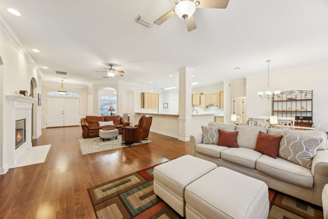 96075 High Pointe Drive Fernandina Beach, FL 32034 - Photo 11 of 42 a living room with furniture kitchen view and a large window