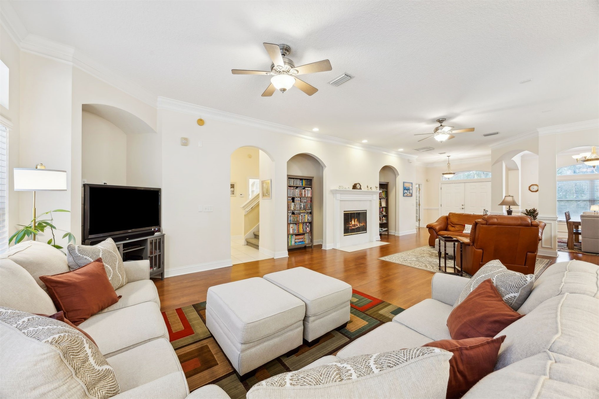 96075 High Pointe Drive Fernandina Beach, FL 32034 - Photo 12 of 42 a living room with furniture and a flat screen tv
