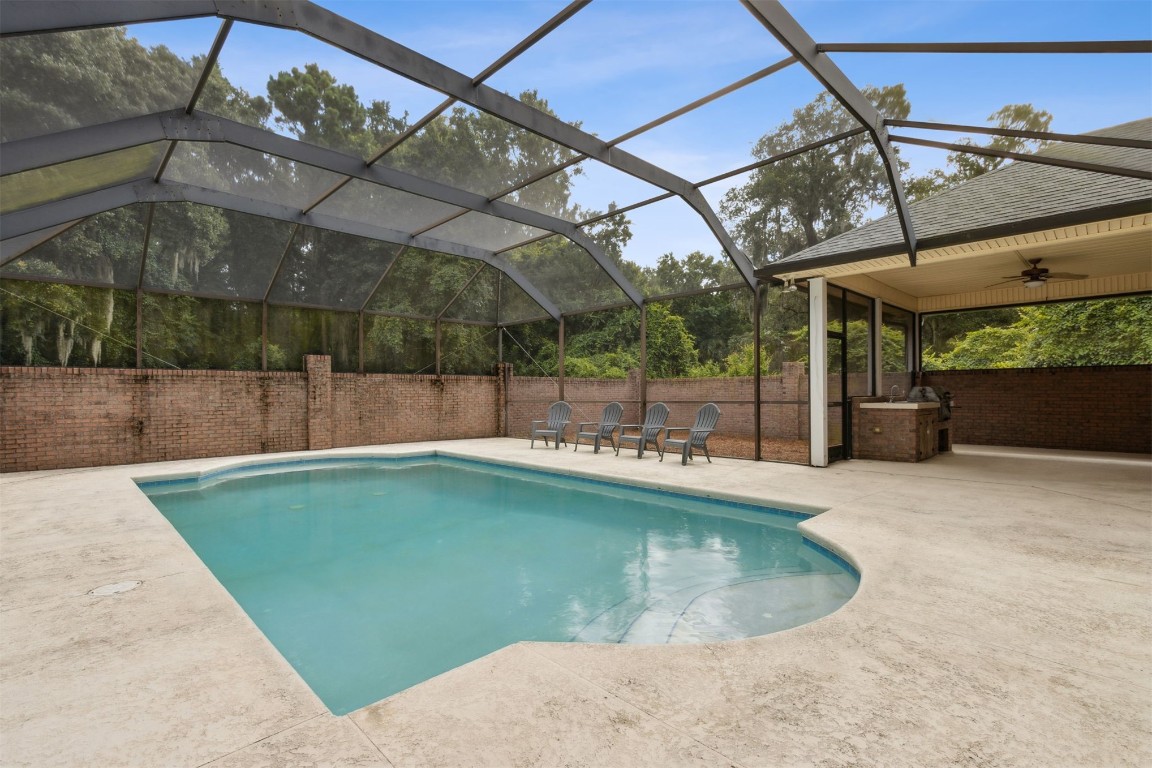 96075 High Pointe Drive Fernandina Beach, FL 32034 - Photo 2 of 42 a view of a backyard with a swimming pool