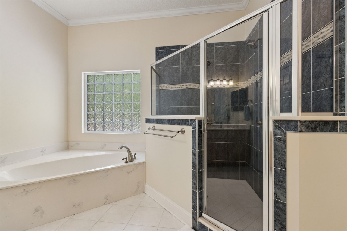 96075 High Pointe Drive Fernandina Beach, FL 32034 - Photo 21 of 42 a bathroom with a bathtub and shower