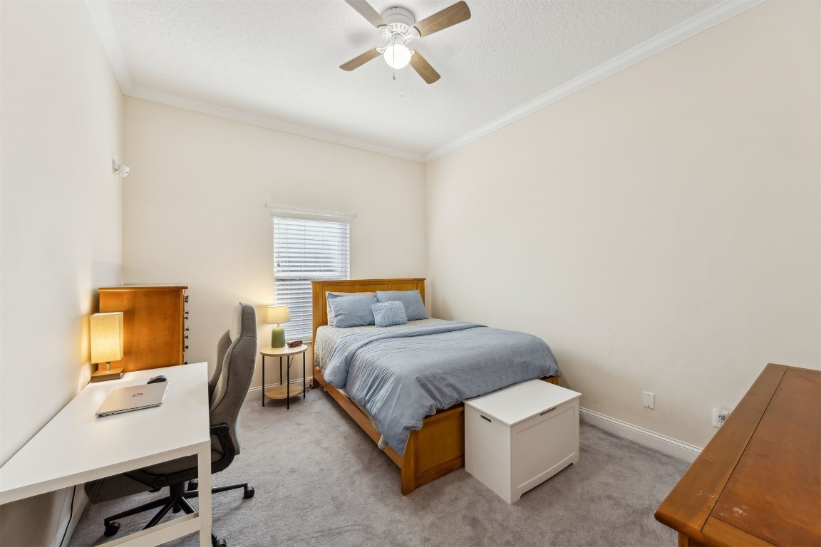 96075 High Pointe Drive Fernandina Beach, FL 32034 - Photo 24 of 42 a bedroom with a bed and a window