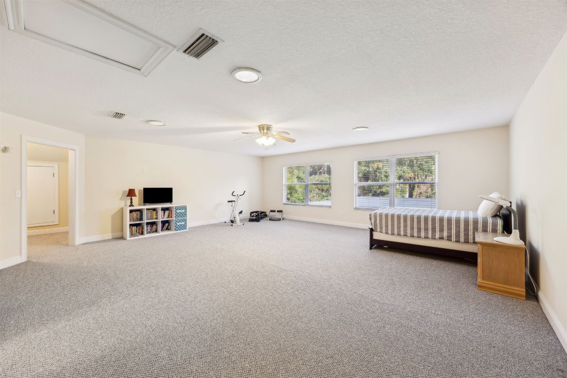 96075 High Pointe Drive Fernandina Beach, FL 32034 - Photo 26 of 42 a view of a bedroom with furniture and window