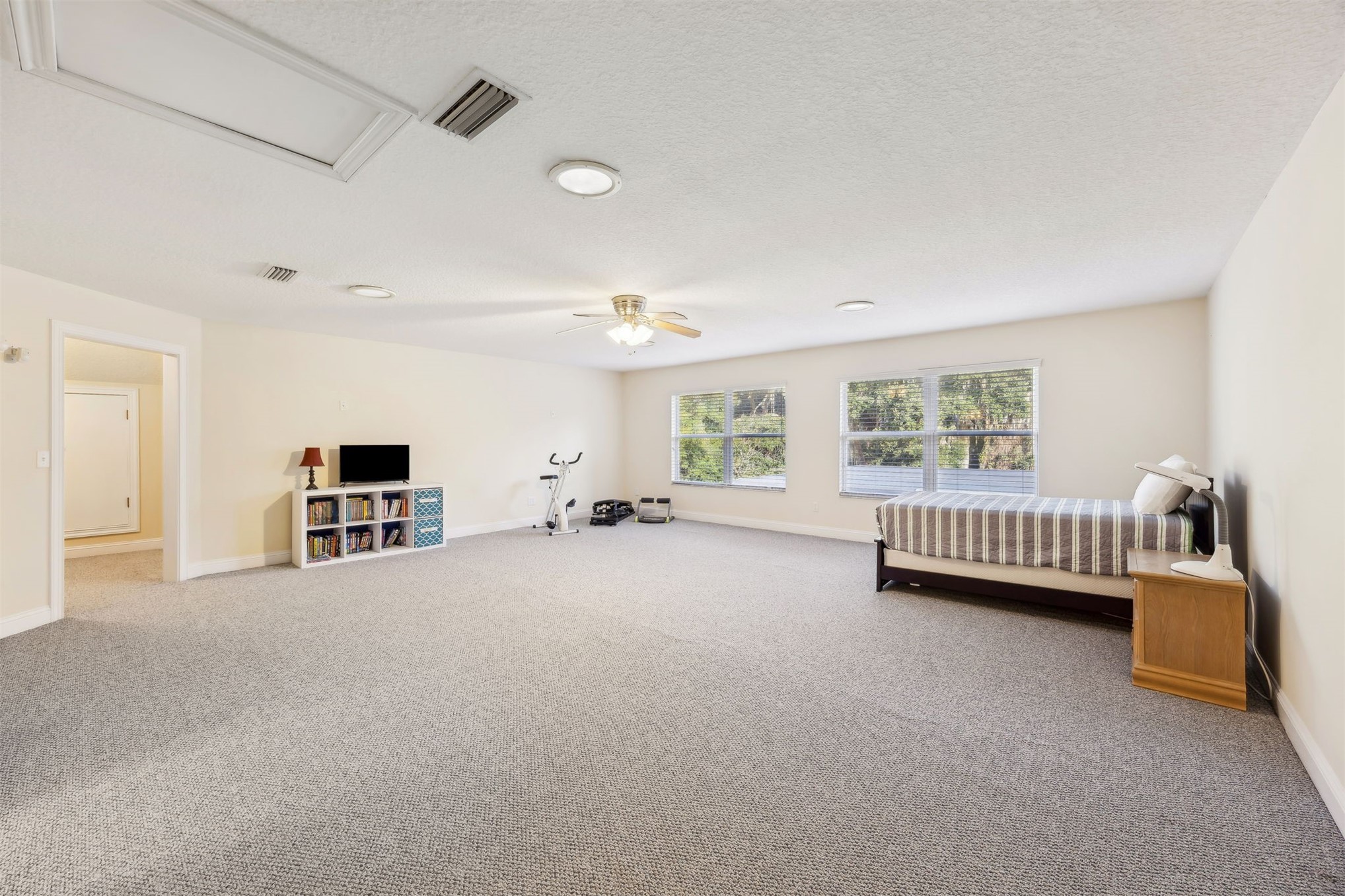 96075 High Pointe Drive Fernandina Beach, FL 32034 - Photo 26 of 42 a view of a bedroom with furniture and windows
