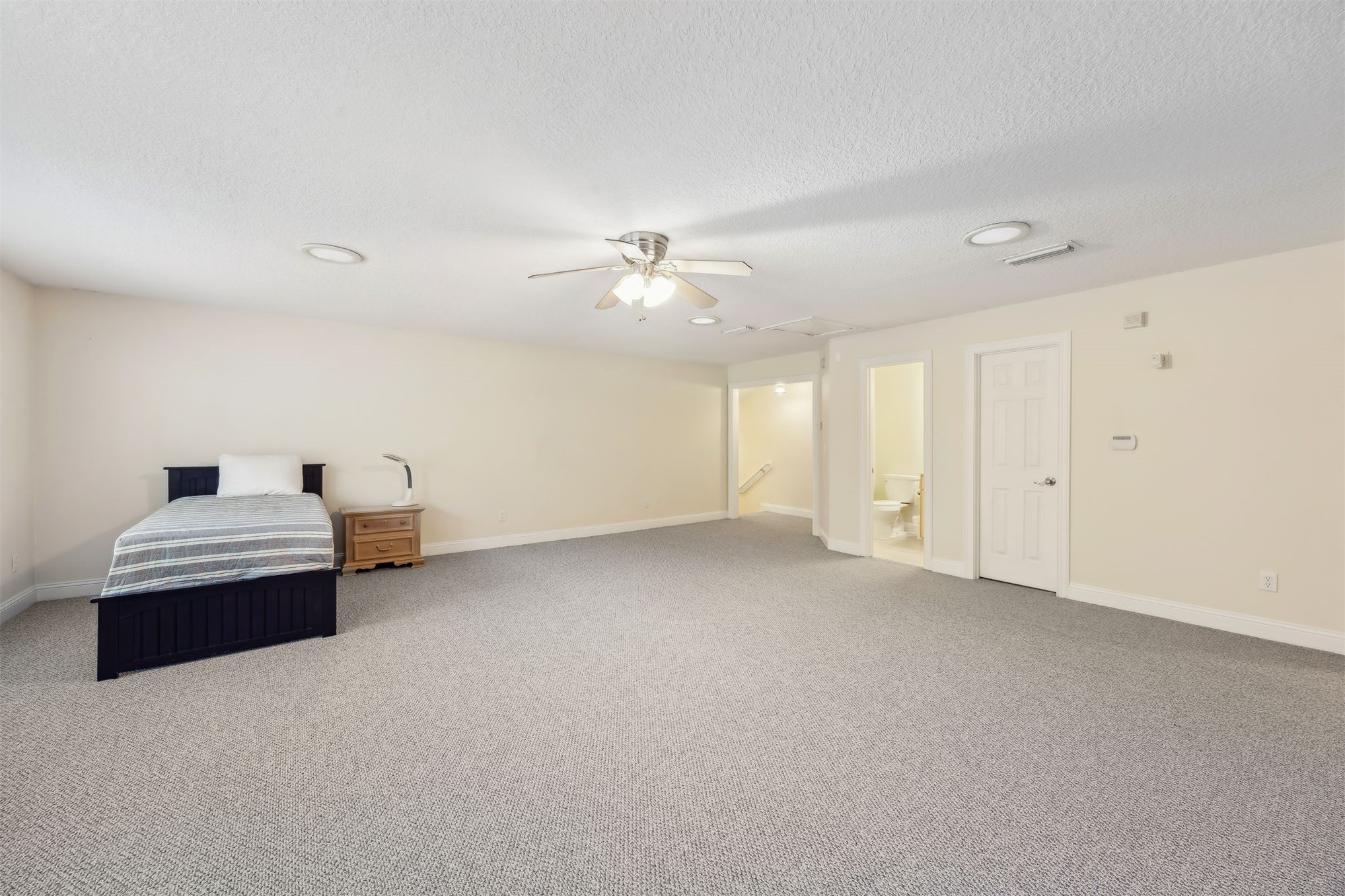 96075 High Pointe Drive Fernandina Beach, FL 32034 - Photo 27 of 42 a view of a livingroom and a chandelier fan
