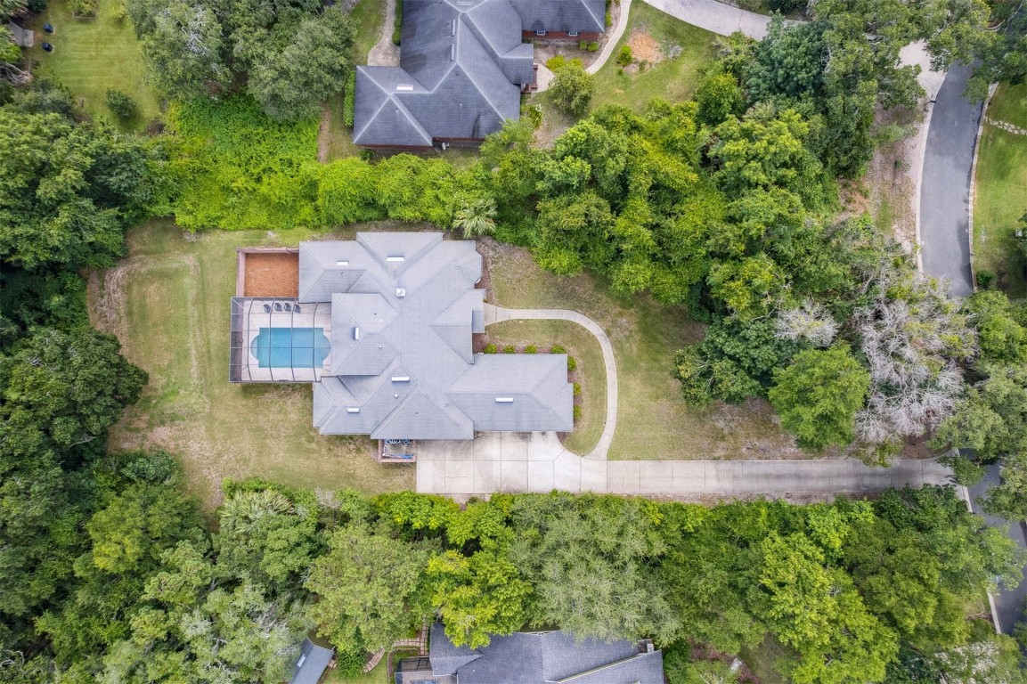 96075 High Pointe Drive Fernandina Beach, FL 32034 - Photo 36 of 42 an aerial view of a house with a yard basket ball court and outdoor seating