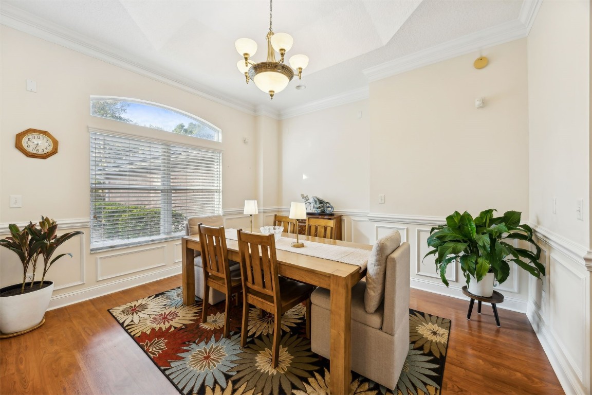 96075 High Pointe Drive Fernandina Beach, FL 32034 - Photo 5 of 42 a view of a dining room with furniture window and wooden floor