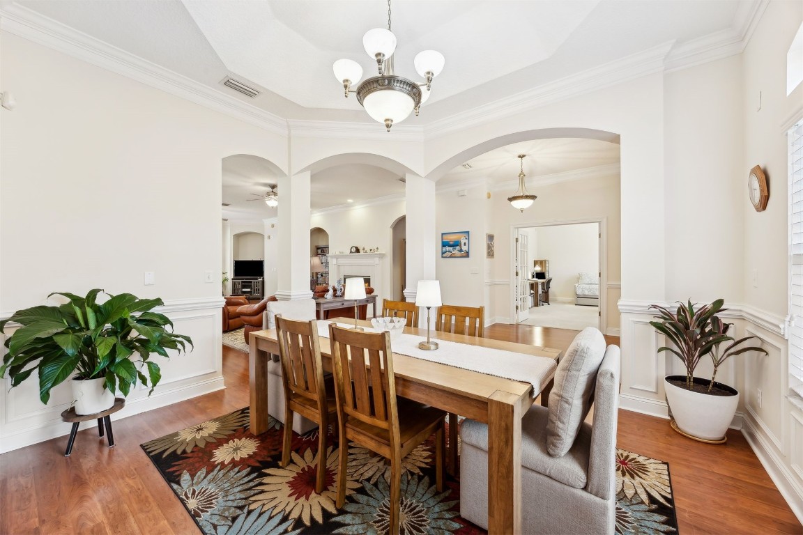 96075 High Pointe Drive Fernandina Beach, FL 32034 - Photo 6 of 42 a view of a dining room with furniture window and wooden floor