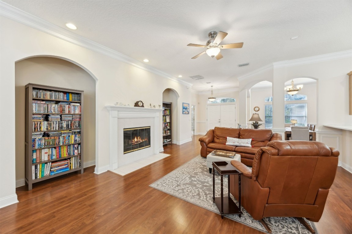 96075 High Pointe Drive Fernandina Beach, FL 32034 - Photo 9 of 42 a living room with furniture and a fireplace