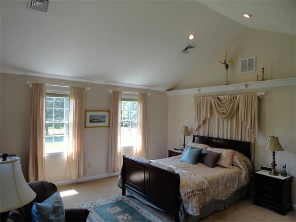 115 Gleasondale Road Stow, MA 01775 - Photo 11 of 14 a bedroom with a bed and window