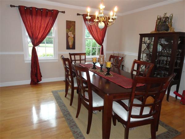 115 Gleasondale Road Stow, MA 01775 - Photo 3 of 14 a view of a dining room with furniture window and outside view