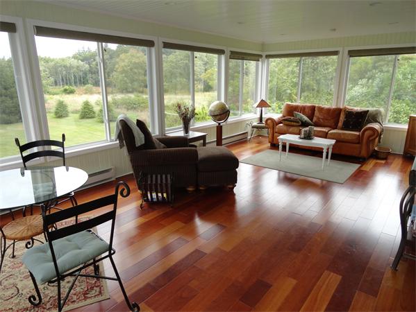 115 Gleasondale Road Stow, MA 01775 - Photo 4 of 14 a living room with furniture and a large window