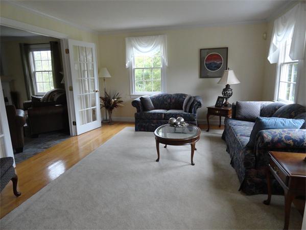 115 Gleasondale Road Stow, MA 01775 - Photo 8 of 14 a living room with furniture and a window