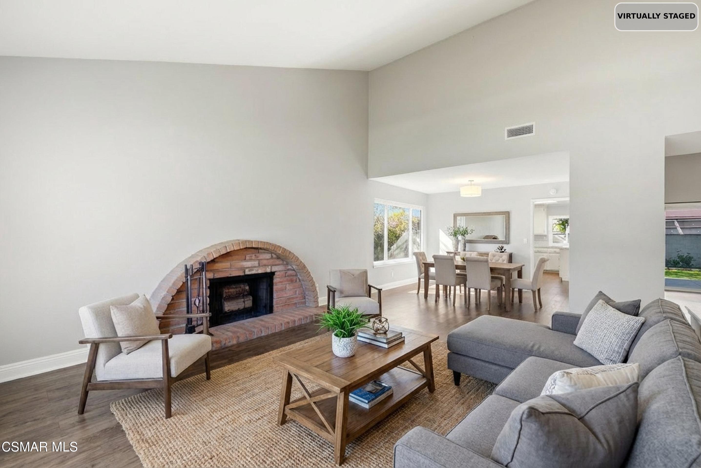 2249 St Clair Avenue Simi Valley, CA 93063 - Photo 11 of 60 a living room with furniture and a fireplace