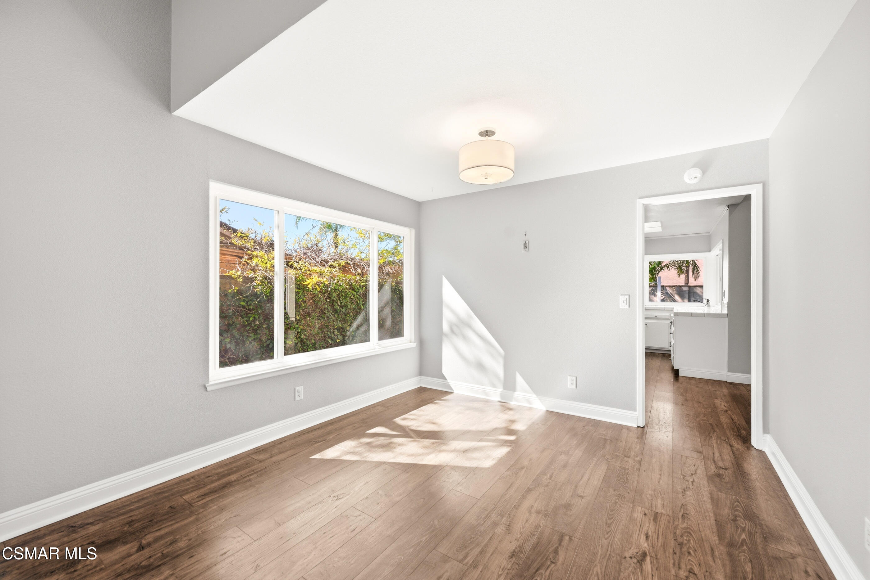 2249 St Clair Avenue Simi Valley, CA 93063 - Photo 15 of 60 an empty room with wooden floor and windows
