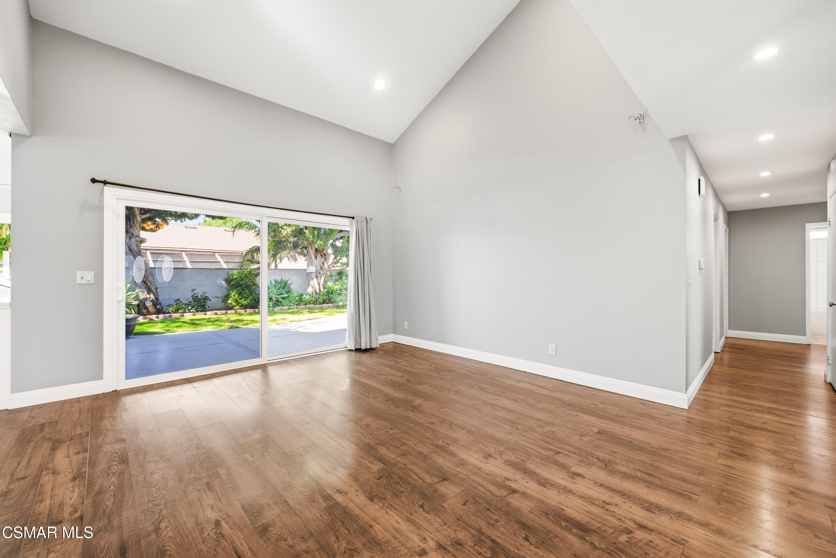 2249 St Clair Avenue Simi Valley, CA 93063 - Photo 18 of 60 an empty room with wooden floor and windows