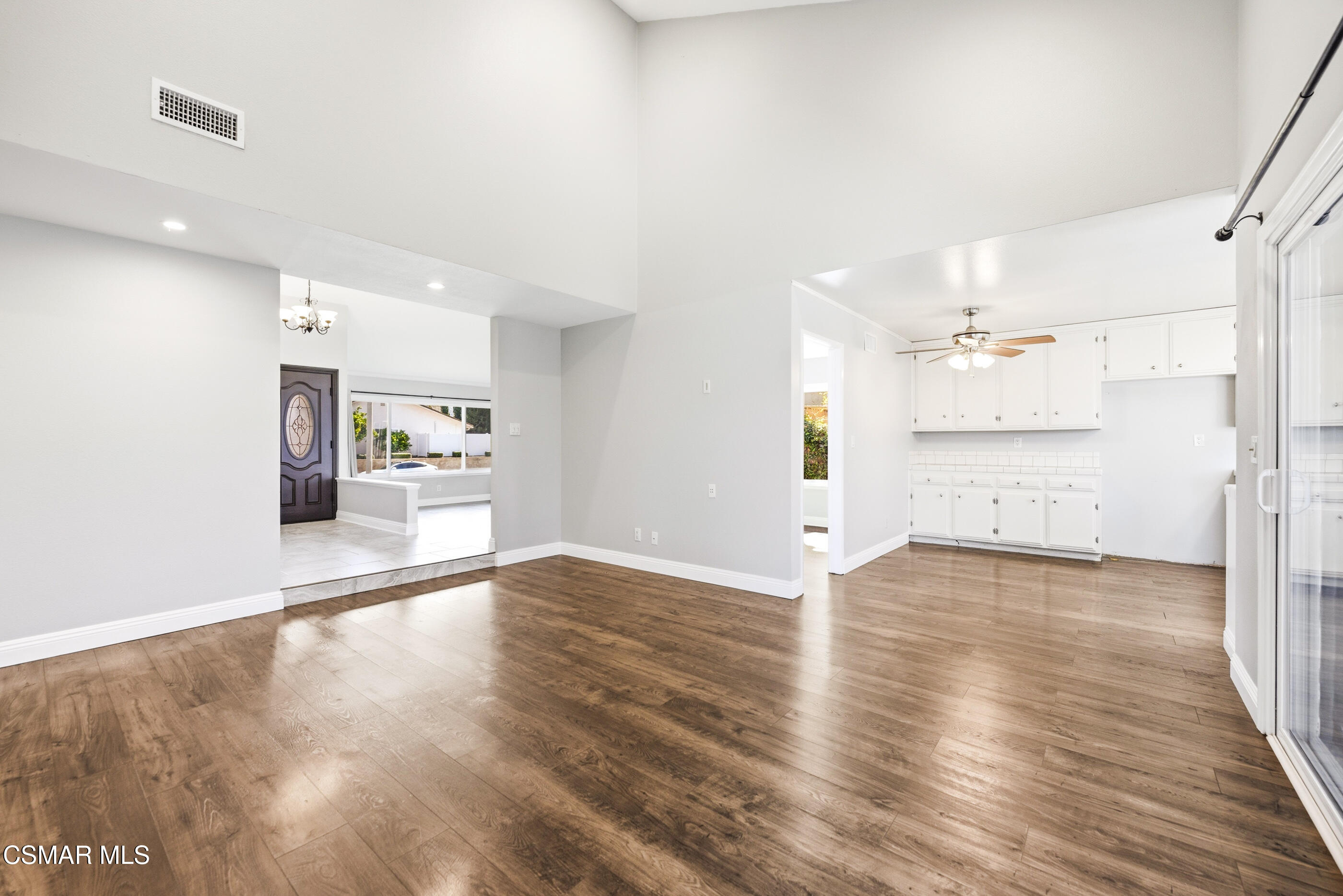 2249 St Clair Avenue Simi Valley, CA 93063 - Photo 19 of 60 a view of a kitchen with a sink and a refrigerator