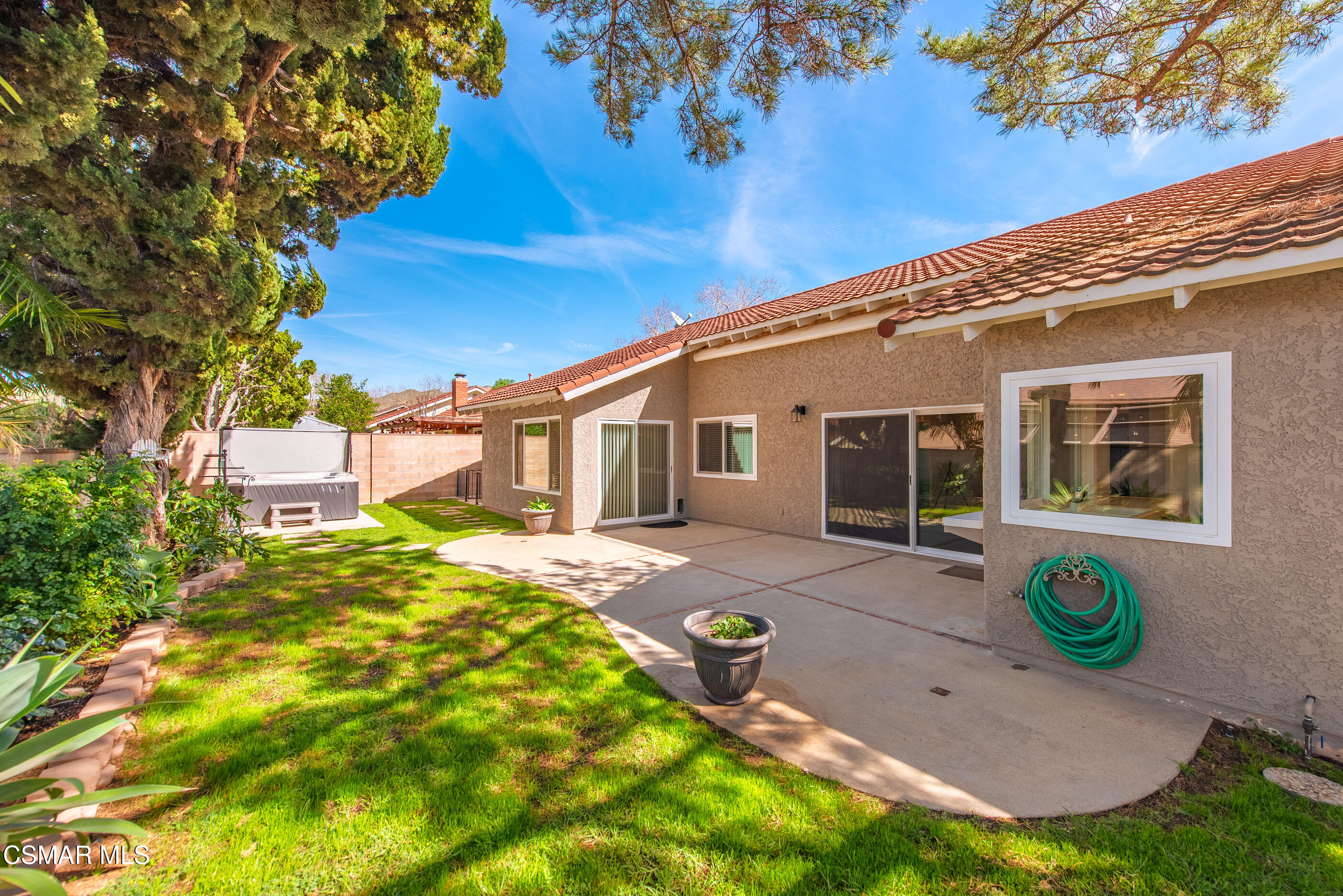 2249 St Clair Avenue Simi Valley, CA 93063 - Photo 26 of 60 a view of a backyard with plants and patio