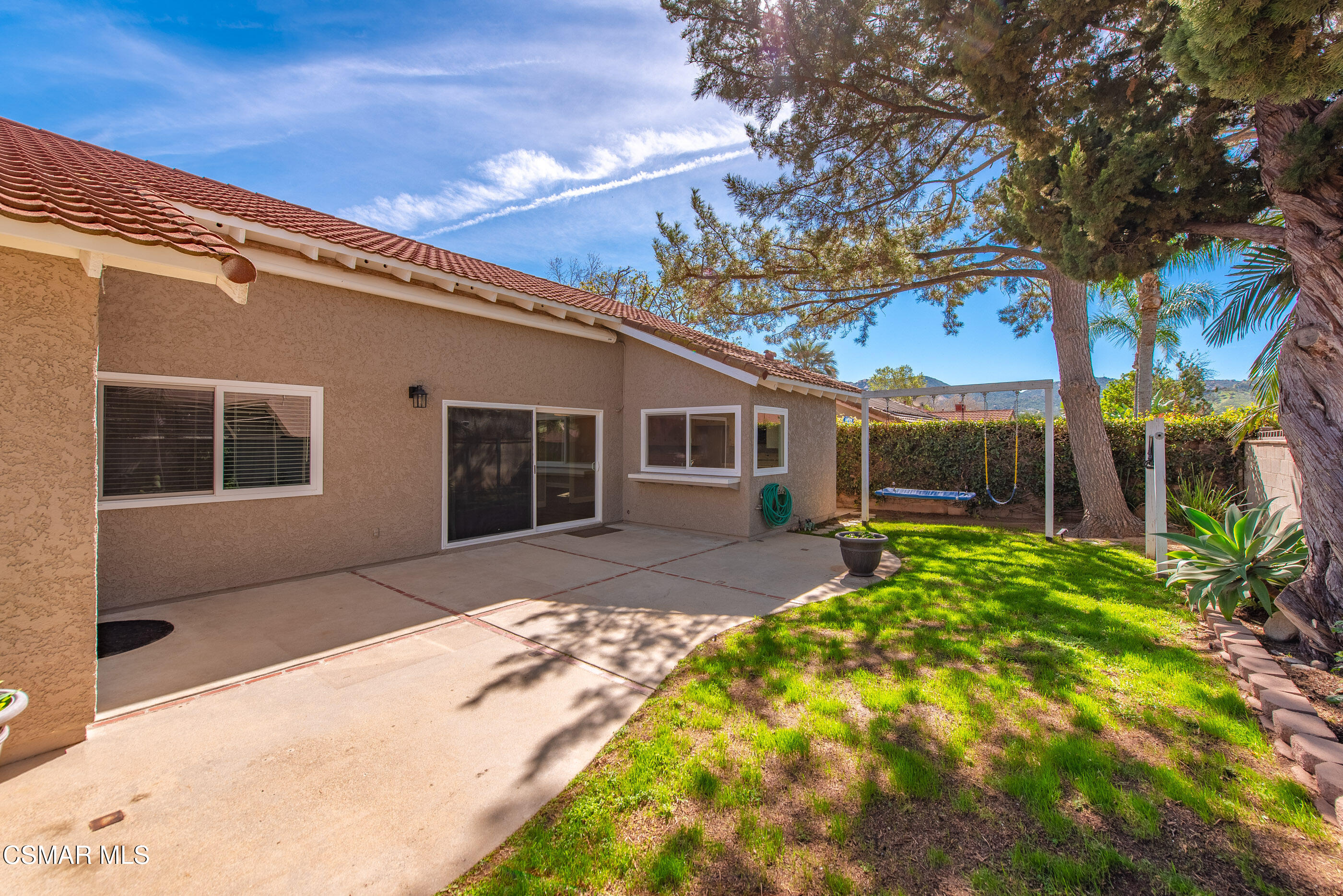 2249 St Clair Avenue Simi Valley, CA 93063 - Photo 27 of 60 a front view of a house with a garden