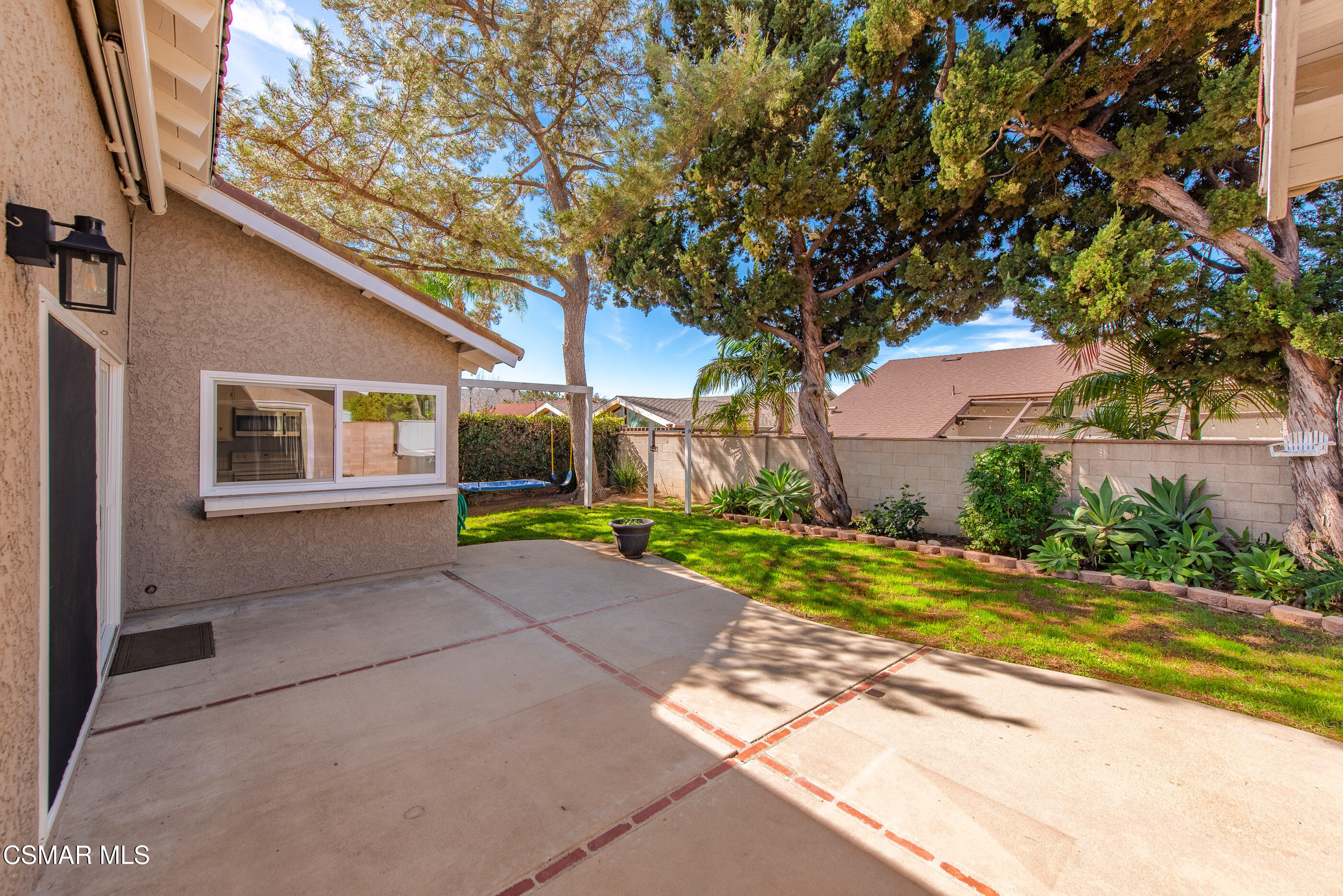 2249 St Clair Avenue Simi Valley, CA 93063 - Photo 28 of 60 a view of a house with a yard and large tree