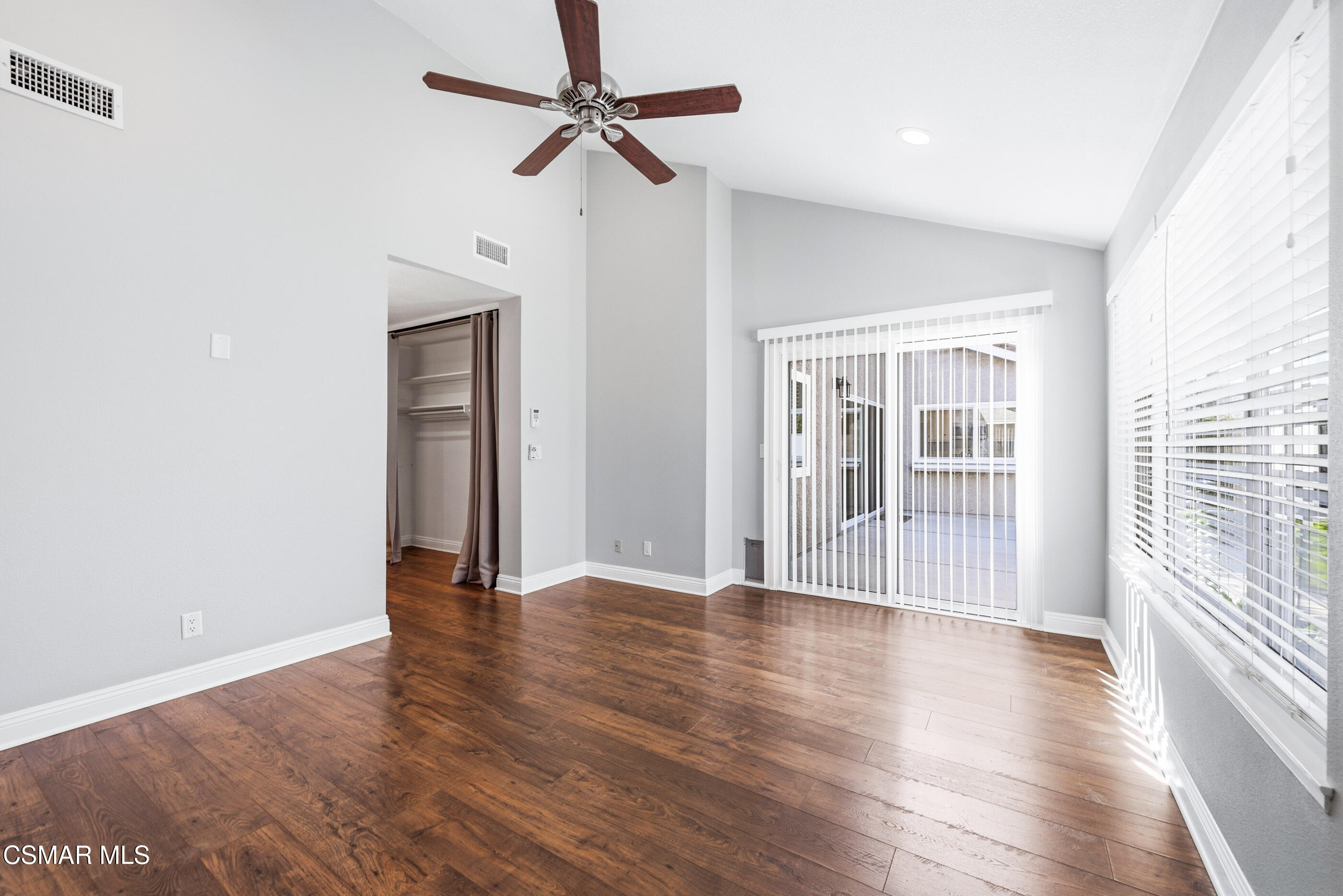 2249 St Clair Avenue Simi Valley, CA 93063 - Photo 30 of 60 a view of an empty room with wooden floor and a window