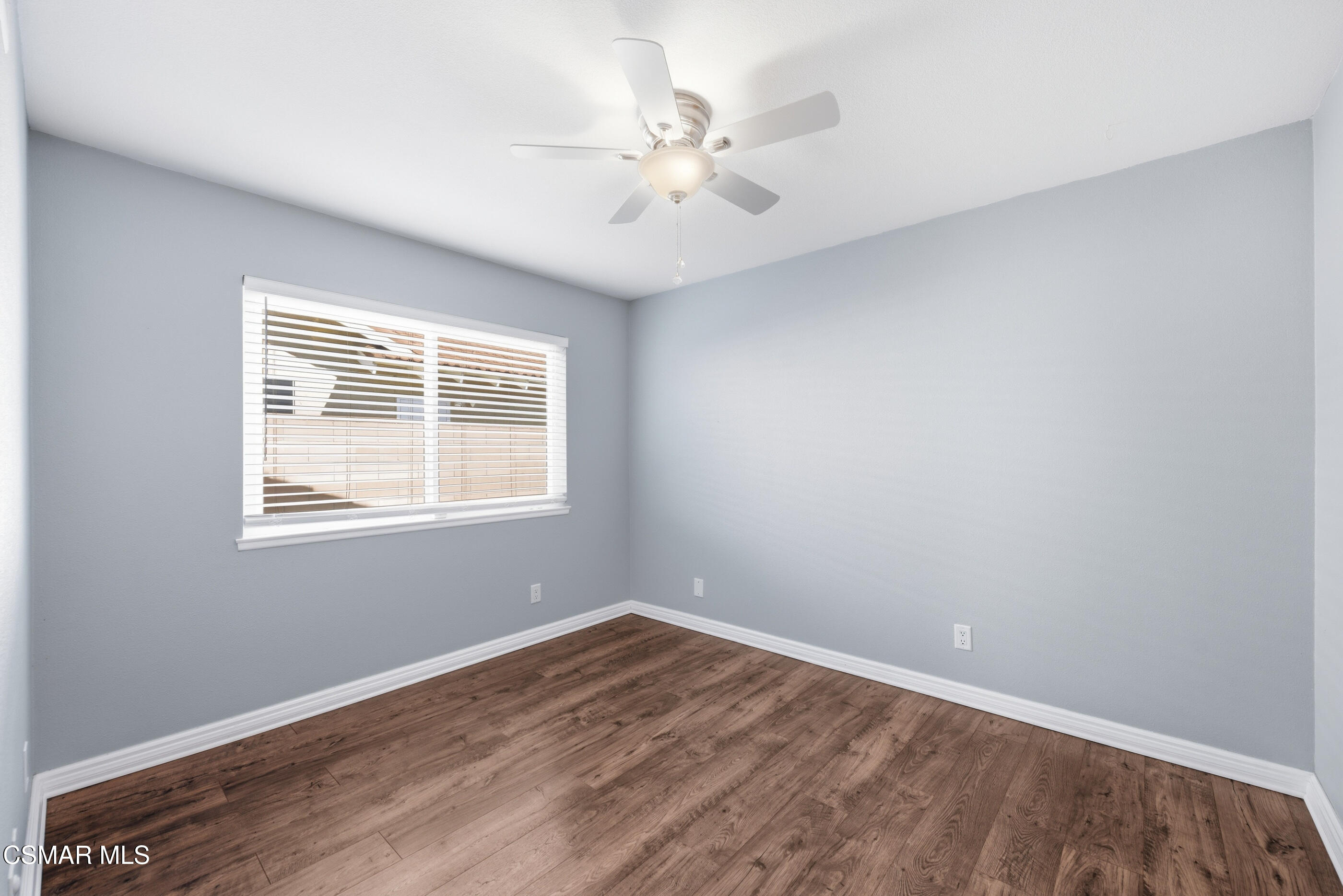 2249 St Clair Avenue Simi Valley, CA 93063 - Photo 39 of 60 wooden floor in an empty room with a window