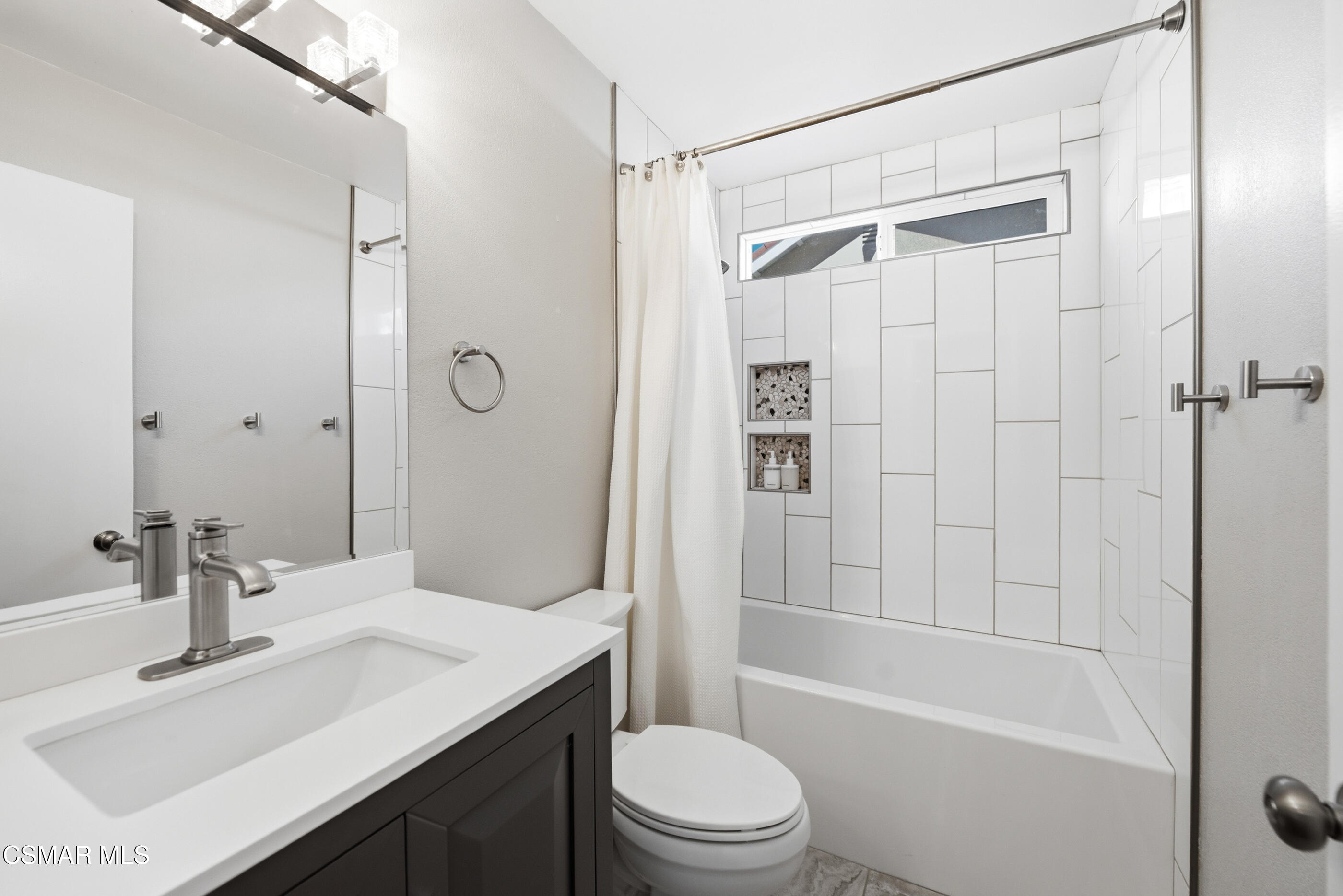 2249 St Clair Avenue Simi Valley, CA 93063 - Photo 42 of 60 a bathroom with a sink a toilet and shower