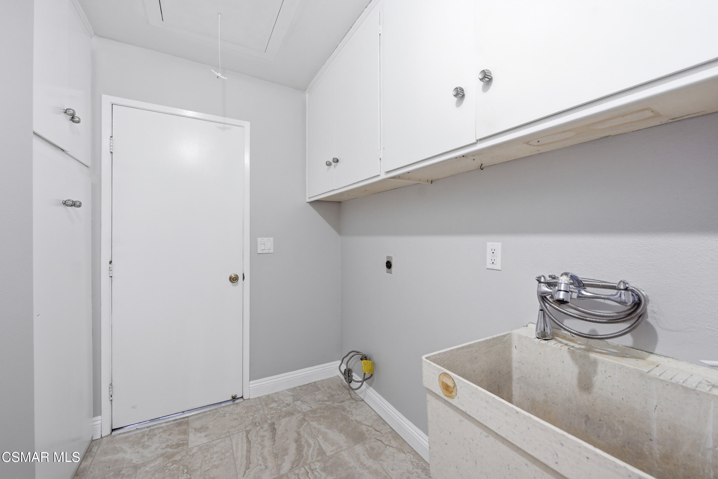 2249 St Clair Avenue Simi Valley, CA 93063 - Photo 43 of 60 a room with a sink and cabinets