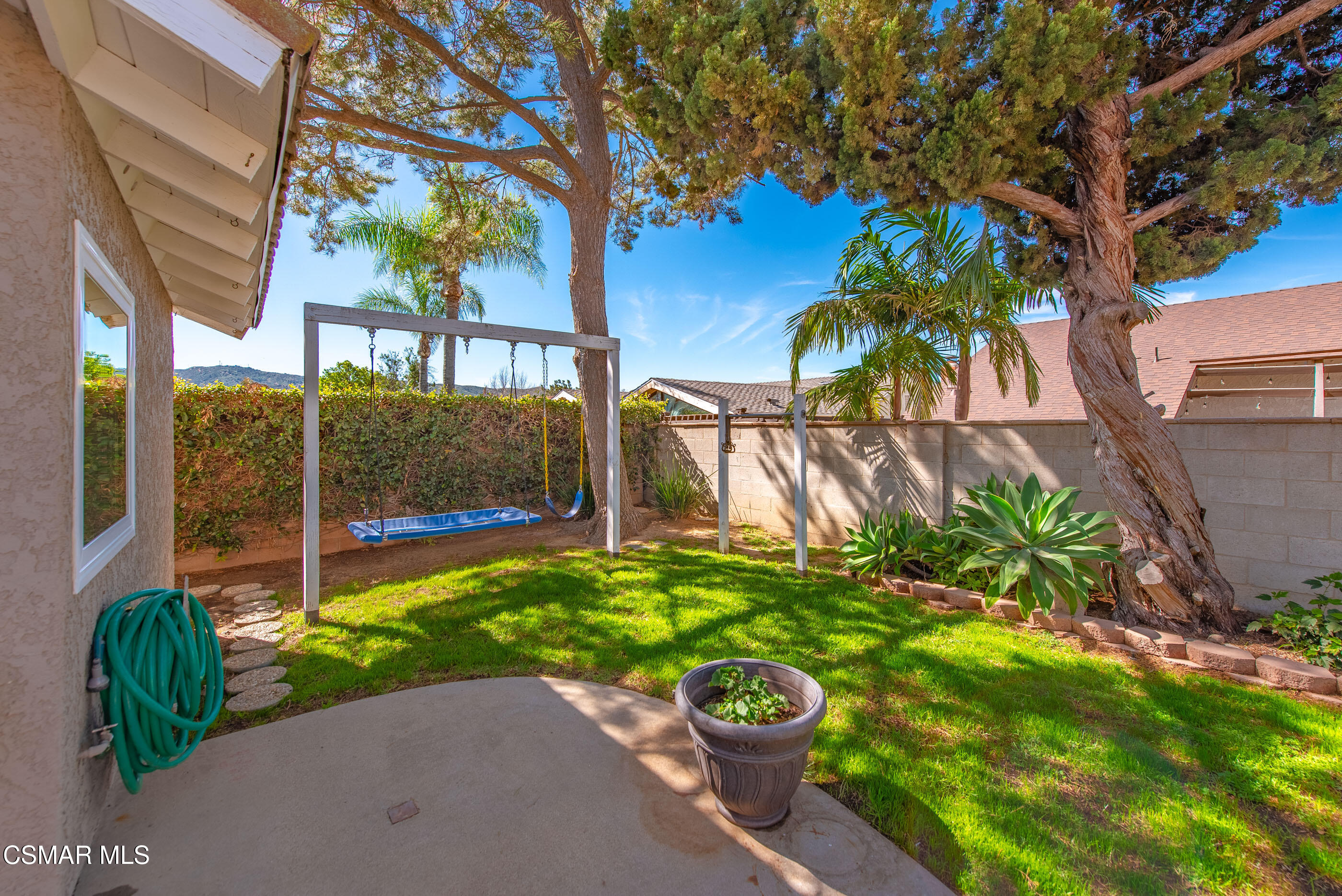 2249 St Clair Avenue Simi Valley, CA 93063 - Photo 45 of 60 a view of a backyard with plants and a patio
