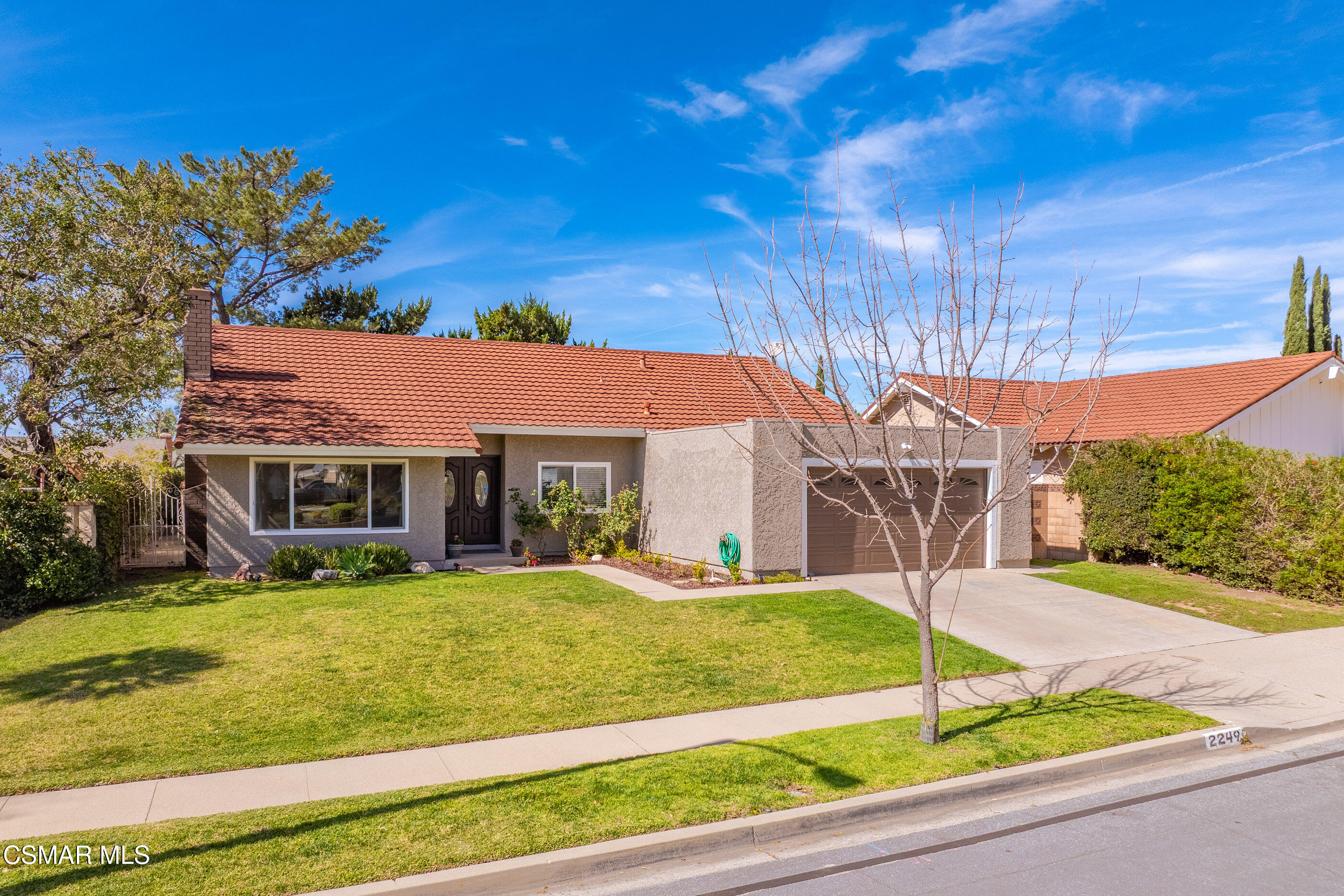 2249 St Clair Avenue Simi Valley, CA 93063 - Photo 57 of 60 a front view of house with yard and garage