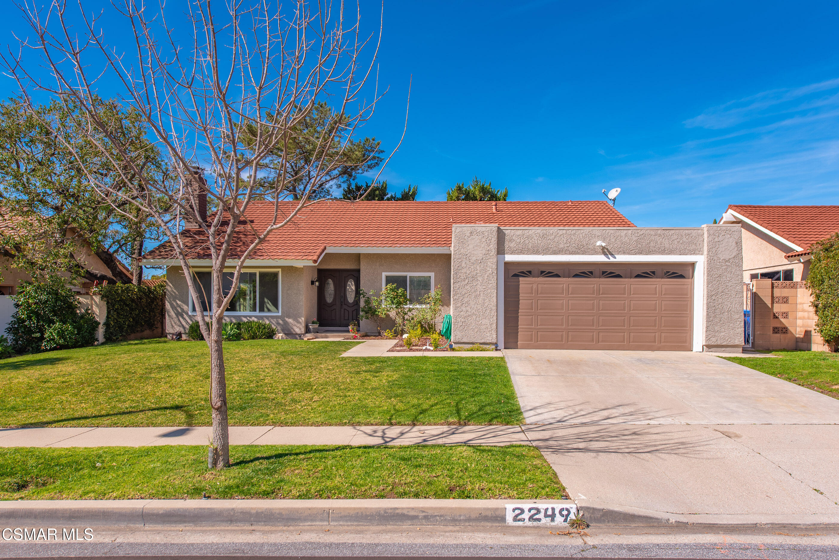 2249 St Clair Avenue Simi Valley, CA 93063 - Photo 59 of 60 a front view of a house with a yard