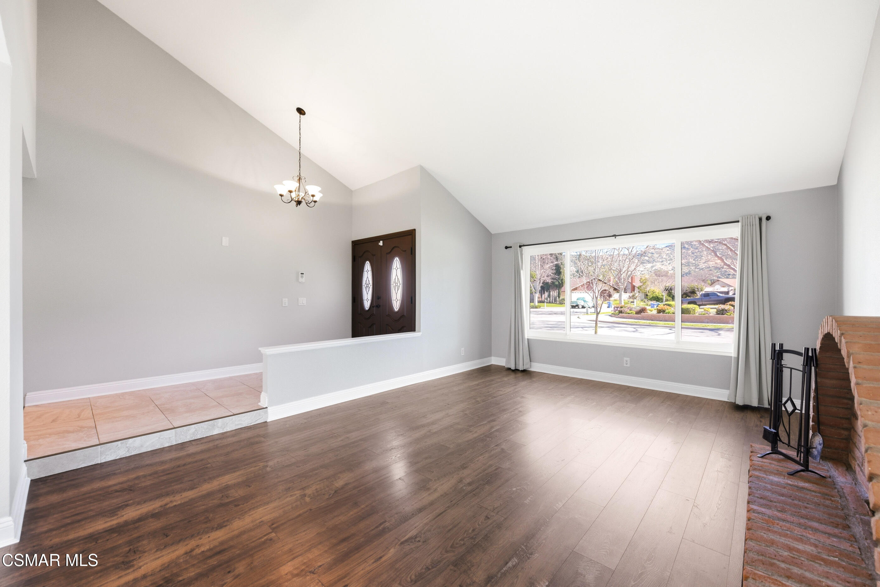 2249 St Clair Avenue Simi Valley, CA 93063 - Photo 10 of 60 an empty room with wooden floor and windows