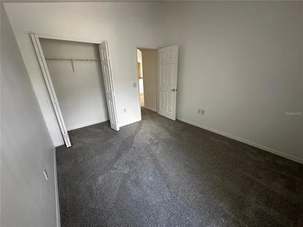 an empty room with closet